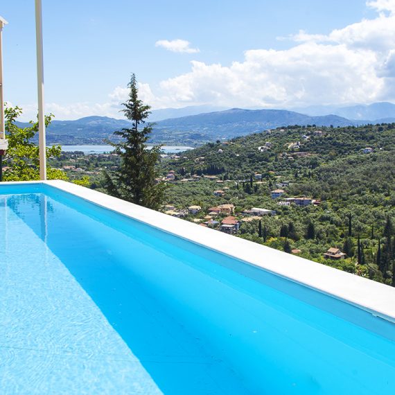 villa alba apolpena lefkas island greece infinity pool with panoramic town view
