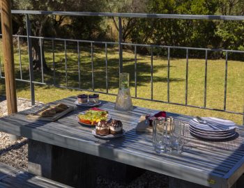 ionian luxury villas levanda lefkada perigiali barbeque table garden food outside lounge
