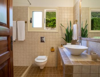 ionian luxury villas levanda lefkada perigiali bathroom mirror flowe towels toilet bidet