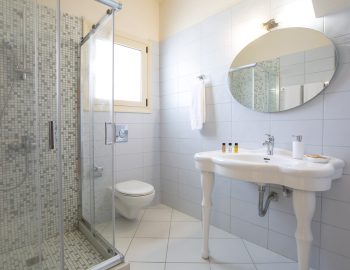 ionian luxury villas levanda lefkada perigiali bathroom mirror shampoo shower toilet window light