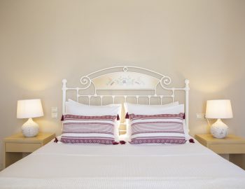 ionian luxury villas levanda lefkada perigiali bedroom lights pillows bed tables