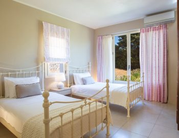 ionian luxury villas levanda lefkada perigiali bedroom single beds window air conditioning curtains