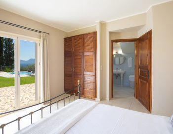 ionian luxury villas levanda lefkada perigiali closet bathroom bedroom window pillows closet