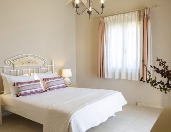 ionian luxury villas levanda lefkada perigiali flowers widnow curtain bedroom pillows bed table