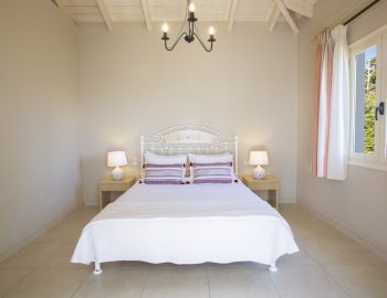 ionian luxury villas levanda lefkada perigiali pillows bed bedroom window lights