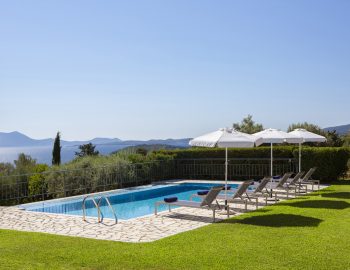 ionian luxury villas levanda lefkada perigiali swimming pool beach chairs view sea trees garden outdoor area