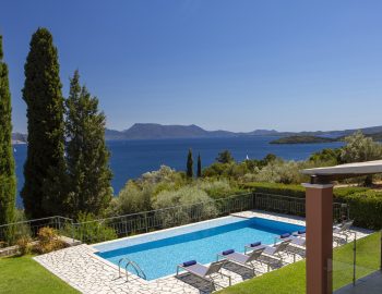ionian luxury villas levanda lefkada perigiali swimming pool trees view garden beach chairs