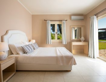 ionian luxury villas olivia lefkada perigiali bedroom mirror window pillows view