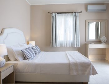 ionian luxury villas olivia lefkada perigiali mirror bed double pillows lights bed table mirror