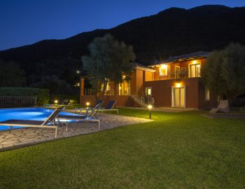 ionian luxury villas olivia lefkada perigiali night outdoor area garden property building lights swimming pool beach chairs
