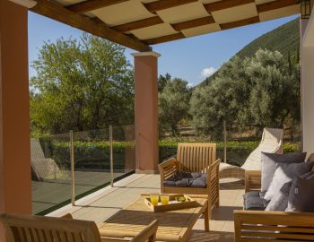 ionian luxury villas olivia lefkada perigiali outdoor lounge trees mountain pillows