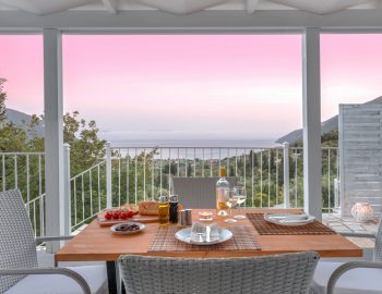 vasiliki-cottages-villa-afteli-accommodation-for-couples-and-adults-only-outdoor-dining-with-sunset