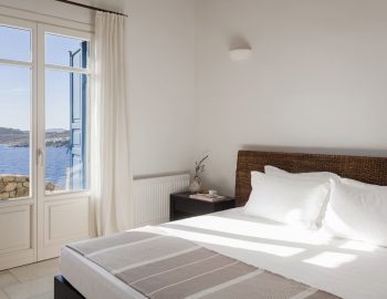 villa-amvrosia-agios-lazaros-mykonos-greece-double-bedroom-with-sea-view-balcony