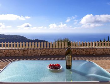villa arenaria chortata lefkada greece balcony table with panoramic seaview