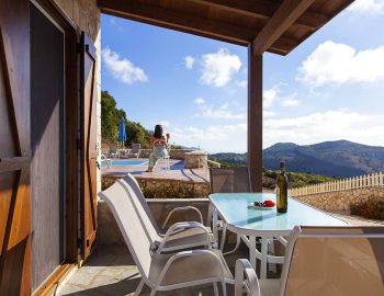 villa arenaria chortata lefkada greece balcony table with pool view