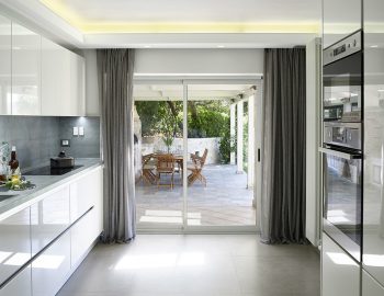 villa christina sivota epirus greece kitchen with outdoor dining access