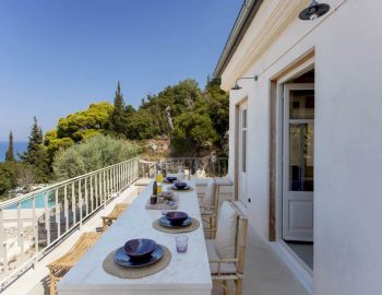villa dalula agios nikitas lefkada greece outdoor balcony dining with pool view