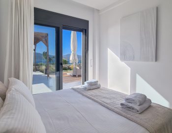 villa empeiria paleros greece bedroom towels pillows window curtain