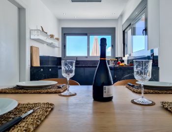 villa emperia paleros greece champage wine glasses dinning area kitchen