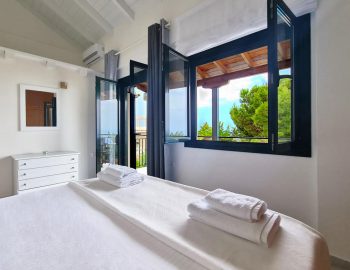 villa endless blue kalamitsi lefkada greece upper level bedroom with private balcony 2