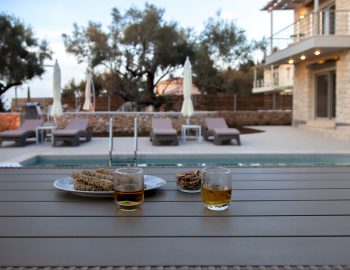 villa erato lefkada greece pool lounger drinks outdoor