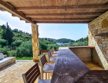 villa giulia sivota lefkada epirus greece outdoor view high chairs bar stones