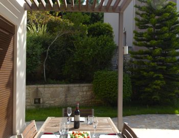 villa guilia sivota lefkada epirus greece garden table chairs dining area seating area outside wine