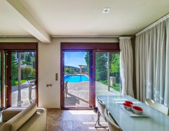 villa guilia sivota lefkada epirus greece living room dining room seating area swimming area windows garden