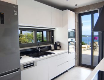 villa haris nidri lefkada black and white big kitchen big window