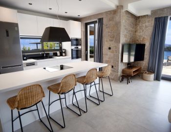 villa haris nidri lefkada dinning area high chairs kitchen