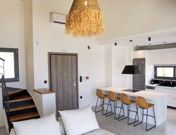villa haris nidri lefkada living room dinning area high chairs mat light