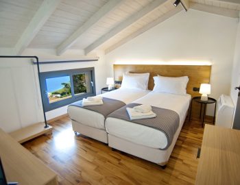 villa haris nidri lefkada roof bedroom two beds white bedroom