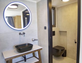 villa haris nidri lefkada round mirror black washbasin
