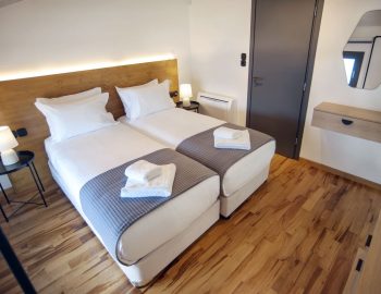 villa haris nidri lefkada white bed room two beds wood comfort