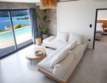 villa haris nidri lefkada white sofa living room window sea view from inside