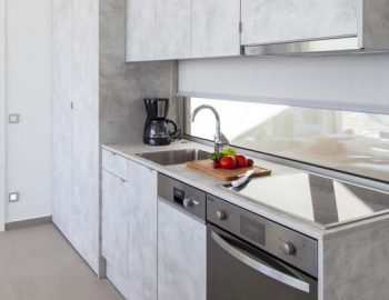 villa-ioulia-sivota-cave-style-thesprotias-fully-equipped-kitchen-modern-oven-open-plan