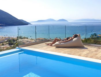 villa irene vasiliki lefkada lefkas girl on cushion private pool sea view header photo