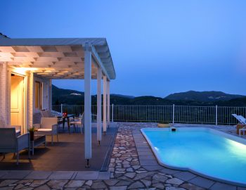 villa katsiki vasiliki cottages lefkada greece cover photo panoramic sea ocean city sunset mountain view privacy private pool deck chair patio perfect for couples outside furniture