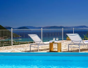 villa katsiki vasiliki cottages lefkada greece cover photo panoramic sea ocean city sunset mountain view privacy private space pool deck chair sunshade patio perfect for couple