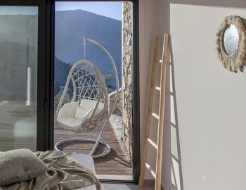 villa luca geni desimi lefkada greece lower level double bedroom with swinging chair feature 1