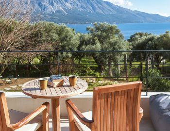 villa-mouria-paleros-greece-outdoor-table-with-garden-and-sea-views