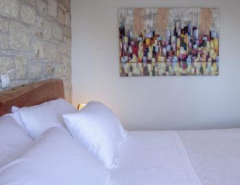 villa myrto lefkada greece bedroom with art work