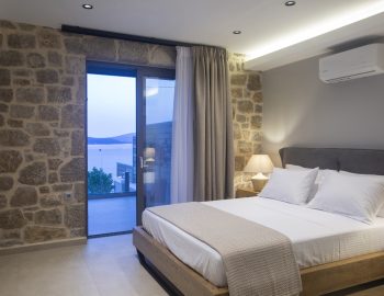 villa onar perigiali lefkada greece stone wall bedroom king size bed