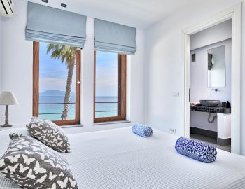 villa-paleros-greece-bedroom-with-ensuite-bathroom
