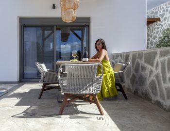 villa petalouda paleros greece woman dining outdoor