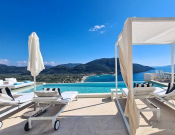 villa ponti vasiliki lefkada greece with sun loungers and bed
