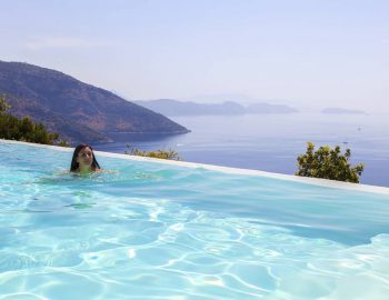 villa posidonia sivota lefkada greece girl swimming infinity pool