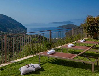 villa rodi mikros gialos lefkada greece sun loungers with sea view