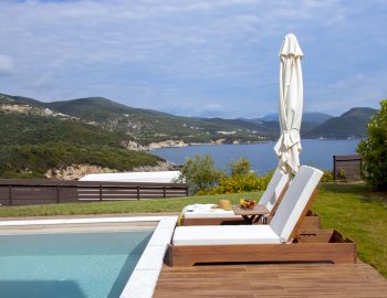 villa tessera zavia ressort syvota outside pool view white sunbeds