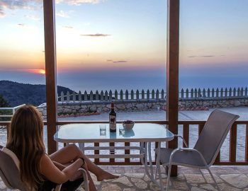 villa vissala arenaria accommodation lefkada lefkas xortata girl sitting looking at sunset 1